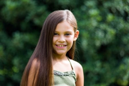 Smiling little girl in the park