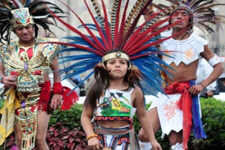 People dressed in Aztec costumes during the festival in Mexico City.