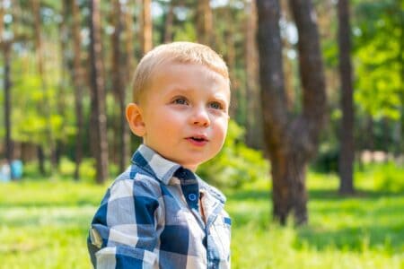 Little boy spending time in the park