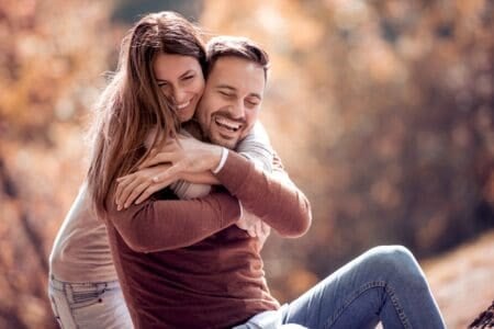 Married couple celebrating husbands birthday with wishes