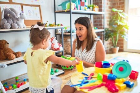 Teacher with child celebrating teachers birthday