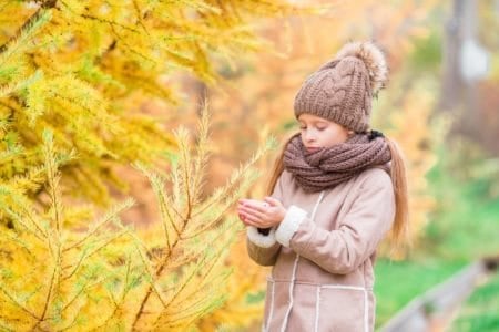 Beautiful girl at autumn day in the park