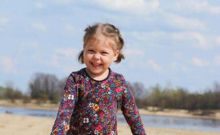 Cheerful girl smiling at the camera