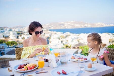 A mother and her daughter having a breakfast