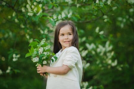 Cute little girl spending time in the park