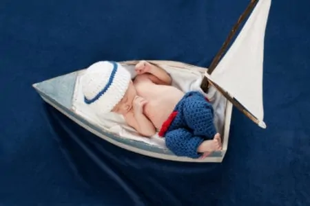 Baby dressed as a sailor