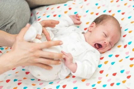 Newborn baby arching their back