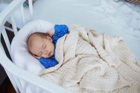 Baby sleeping in a co-sleeper