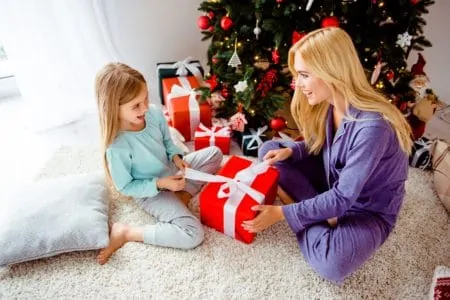 Mom giving 13 year old girl her Christmas present