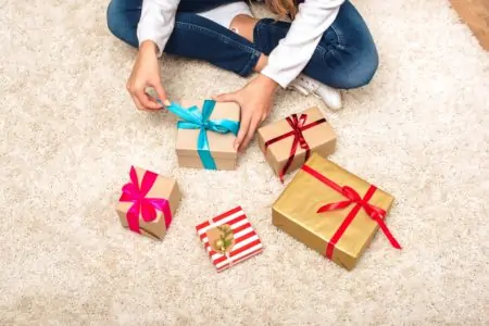 Teenager opening gifts