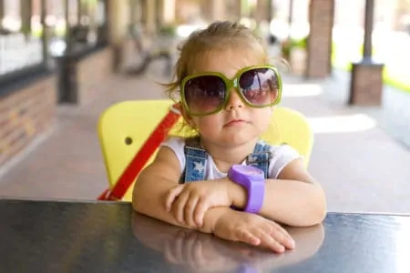 Cool kid with sunglasses and kids watch