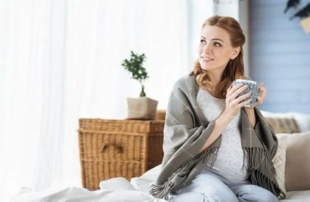 Breastfeeding mother drinking lactation tea