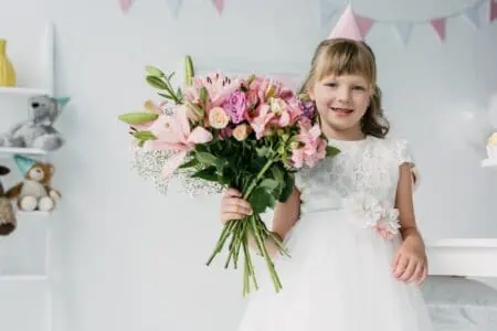 Niece holding flowers celebrating birthday