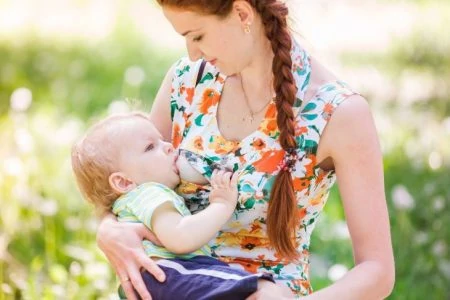 Mother breasfeeding her toddler