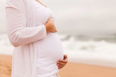 Pregnant woman at the beach