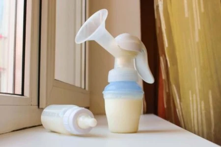 Breast pump sitting on the windowsill