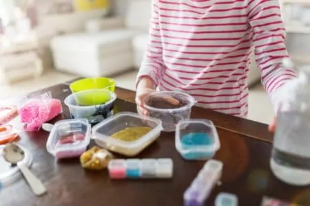 Young girl making slime without borax