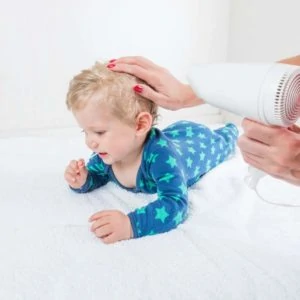 Blow drying baby's hair