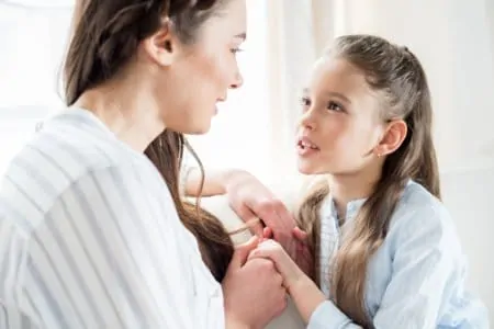 Mother and daughter talking